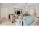 Bright living room featuring neutral walls, tile flooring, ceiling fan and comfortable seating at 4110 Noble Pl, Parrish, FL 34219