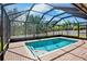 A stunning screened-in pool with brick patio offers the perfect place for relaxation and outdoor enjoyment at 4110 Noble Pl, Parrish, FL 34219