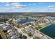 Aerial view of a residential community featuring lakes, homes, and natural beauty at 4202 Donnington Dr, Parrish, FL 34219