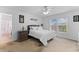 Sunlit bedroom featuring neutral carpet and a view of the back yard at 4202 Donnington Dr, Parrish, FL 34219