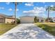 Charming single-story home with a well-maintained lawn and a two-car garage at 4202 Donnington Dr, Parrish, FL 34219