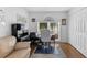 Bright home office with a large window, desk, and a comfortable seating area, ideal for productivity and relaxation at 4202 Donnington Dr, Parrish, FL 34219