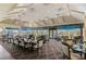 Large, open dining area with multiple tables and chairs, perfect for community gatherings and events at 4306 Presidential Avenue E Cir, Bradenton, FL 34203