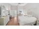 Airy main bedroom with high ceilings, large windows, and pristine decor throughout the space at 4306 Presidential Avenue E Cir, Bradenton, FL 34203