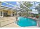 Beautiful backyard with a pool, spa, covered patio, and plenty of space for entertaining at 4306 Presidential Avenue E Cir, Bradenton, FL 34203
