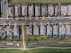 Overhead shot of houses featuring private pools, well-maintained landscaping and the surrounding neighborhood streets at 4793 Antrim Dr, Sarasota, FL 34240