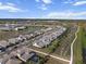 Aerial view of a residential area featuring contemporary homes, neat landscaping and neighborhood streets at 4793 Antrim Dr, Sarasota, FL 34240