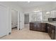Spacious bathroom with double sink, granite countertop, shower and open toilet room at 4793 Antrim Dr, Sarasota, FL 34240