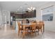 Dining Room with view of Kitchen featuring granite countertops and ample cabinetry at 4793 Antrim Dr, Sarasota, FL 34240