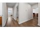 Upstairs hallway with wood flooring at 4793 Antrim Dr, Sarasota, FL 34240