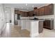 Spacious kitchen with granite countertops, island, and stainless steel appliances at 4793 Antrim Dr, Sarasota, FL 34240