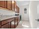 Convenient laundry room equipped with sleek, modern washer and dryer at 4793 Antrim Dr, Sarasota, FL 34240