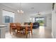 Open-concept living room features ample natural light and tile flooring at 4793 Antrim Dr, Sarasota, FL 34240