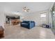 Open floorplan shows living room connected to dining room and kitchen at 4793 Antrim Dr, Sarasota, FL 34240