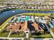 Aerial view of the community clubhouse, pool area, and surrounding homes at 5074 Surfside Cir, Bradenton, FL 34211