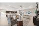 Open-concept living space with a view of the kitchen and dining area, perfect for entertaining and Gathering gatherings at 5074 Surfside Cir, Bradenton, FL 34211