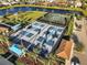 Overhead view of community tennis and sports facilities including well-kept courts at 5074 Surfside Cir, Bradenton, FL 34211