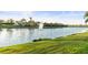 Picturesque water view with fountain and lush green lawn at 5074 Surfside Cir, Bradenton, FL 34211