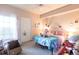 Charming bedroom with colorful decor, plush toys, and a comfortable bed at 5122 Northridge Rd # 110, Sarasota, FL 34238