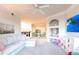 Inviting living room with a comfortable sofa, nook and adjacent to a dining area at 5122 Northridge Rd # 110, Sarasota, FL 34238