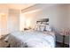 Serene main bedroom features a plush bed, ceiling fan, and a calm, relaxing ambiance at 5122 Northridge Rd # 110, Sarasota, FL 34238