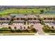 A row of residential houses featuring garages provides modern comforts and neighborhood living at 5710 Palmer Cir # 105, Bradenton, FL 34211