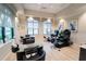 Elegant salon with pedicure stations, comfortable seating, and large windows for natural light at 5710 Palmer Cir # 105, Bradenton, FL 34211