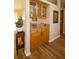 A stylish bar area featuring glass-front cabinets and ample storage space at 7113 91St E St, Palmetto, FL 34221