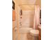 Clean bathroom features a bathtub and shower with tiled walls at 7113 91St E St, Palmetto, FL 34221