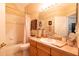 Full bathroom with shower and tub combination and spacious vanity at 7113 91St E St, Palmetto, FL 34221
