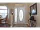 Welcoming foyer featuring a decorative front door, elegant decor and natural light at 7113 91St E St, Palmetto, FL 34221