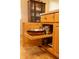 Close-up of kitchen cabinetry with roll out shelves, offering smart space-saving storage solutions at 7113 91St E St, Palmetto, FL 34221