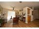 Bright living room featuring hardwood floors, ample natural light, and comfortable seating arrangement at 7113 91St E St, Palmetto, FL 34221