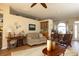 Comfortable living room featuring a neutral sofa, stylish decor and an open floor plan at 7113 91St E St, Palmetto, FL 34221
