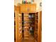 A pantry is stocked with food items, organized on shelving to maximize kitchen space at 7113 91St E St, Palmetto, FL 34221