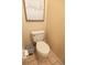 Neutral powder room with a classic white toilet at 7113 91St E St, Palmetto, FL 34221