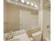 Well-lit bathroom with a large mirror and a white vanity at 850 S Tamiami Trl # 301, Sarasota, FL 34236