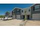Attractive townhome exterior with attached garage, lush landscaping, and inviting curb appeal at 8612 Milestone Dr, Sarasota, FL 34238