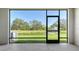Enclosed tiled patio has a lovely view of the pond and fountain at 8612 Milestone Dr, Sarasota, FL 34238