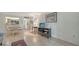 Comfortable living room and dining area with open kitchen concept at 966 La Costa Cir # 1, Sarasota, FL 34237