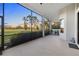 Expansive screened lanai with views of the lush green golf course at 15520 Castle Park Ter, Lakewood Ranch, FL 34202