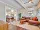 Living room with hardwood floors and plenty of light near the dining room at 1705 Wharf Rd, Sarasota, FL 34231