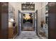 Stunning entryway featuring glass double doors that open to a brick drive and sunset at 19424 Ganton Ave, Lakewood Ranch, FL 34202