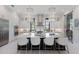 Contemporary kitchen with a large island, stainless steel appliances, and modern lighting at 19424 Ganton Ave, Lakewood Ranch, FL 34202