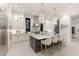Beautiful kitchen with a large island, stainless steel appliances, and pendant lighting at 19424 Ganton Ave, Lakewood Ranch, FL 34202