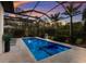 Beautiful screened-in pool and spa with comfortable lounge seating for relaxation and enjoyment at 19424 Ganton Ave, Lakewood Ranch, FL 34202