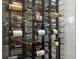 Close-up of a custom wine storage unit, displaying a variety of wine bottles at 19424 Ganton Ave, Lakewood Ranch, FL 34202