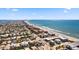 Extensive aerial view of beachfront community displaying beautiful ocean views and neighborhood layout at 204 66Th Street, Holmes Beach, FL 34217