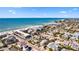Stunning aerial view showcases the proximity to the Gulf, the beach and the island's charming architecture at 204 66Th Street, Holmes Beach, FL 34217