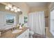 Full bathroom featuring neutral walls and tiled shower and bathtub area at 204 66Th Street, Holmes Beach, FL 34217